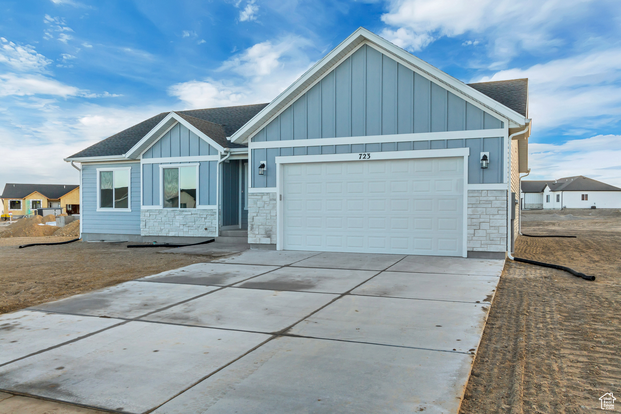 View of front of home featuring a garage