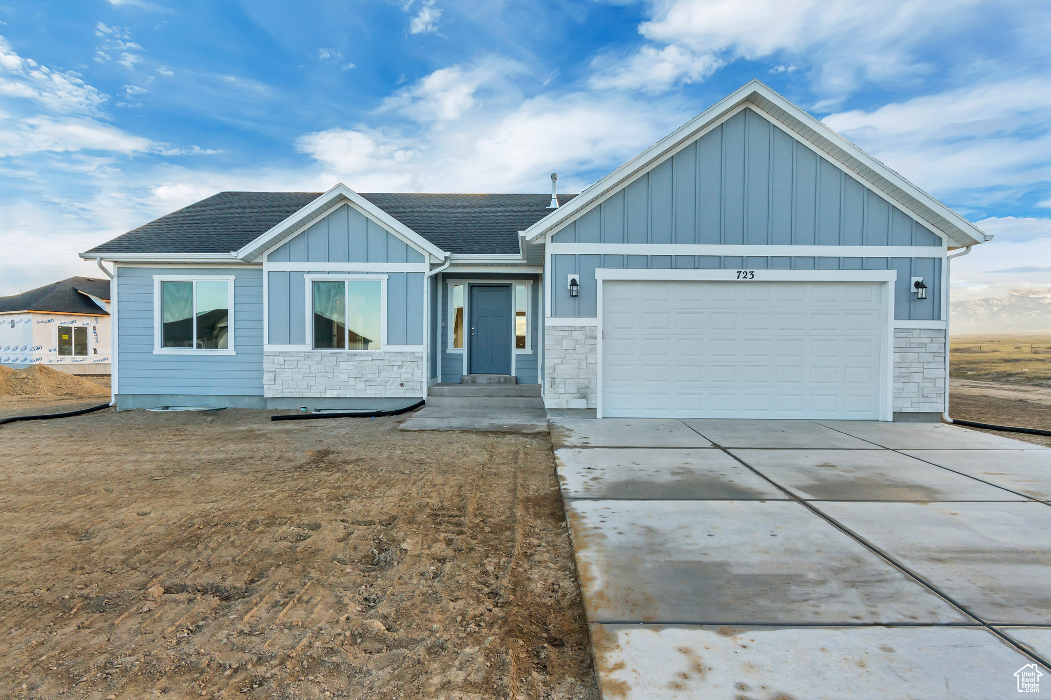 View of front of property with a garage