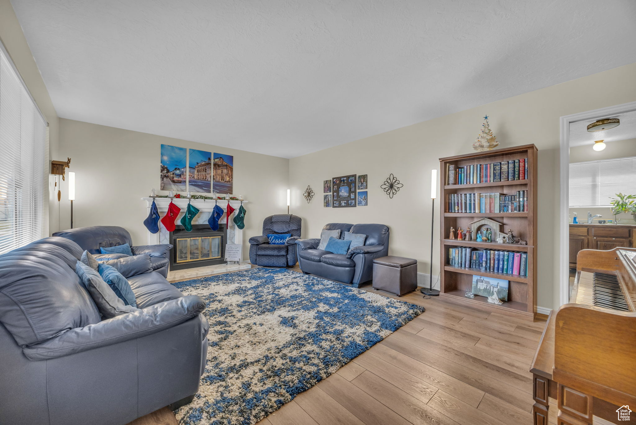 Living room featuring light hardwood / wood-style flooring and sink