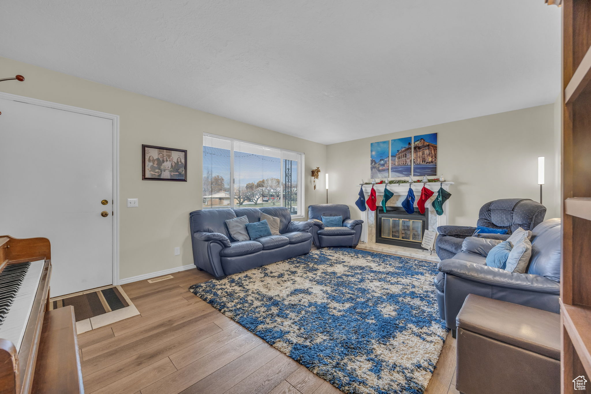 Living room with hardwood / wood-style floors