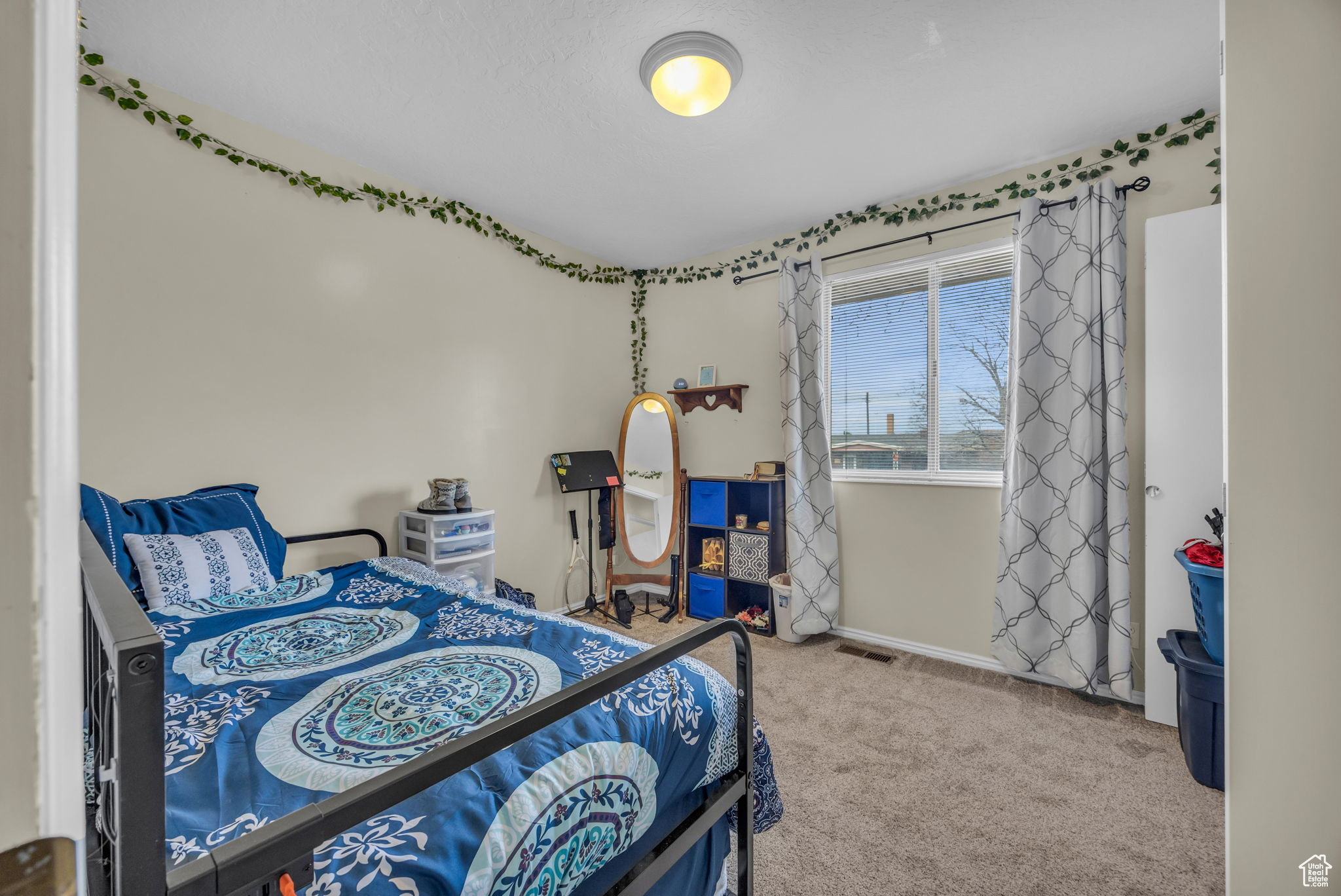 Bedroom featuring carpet floors