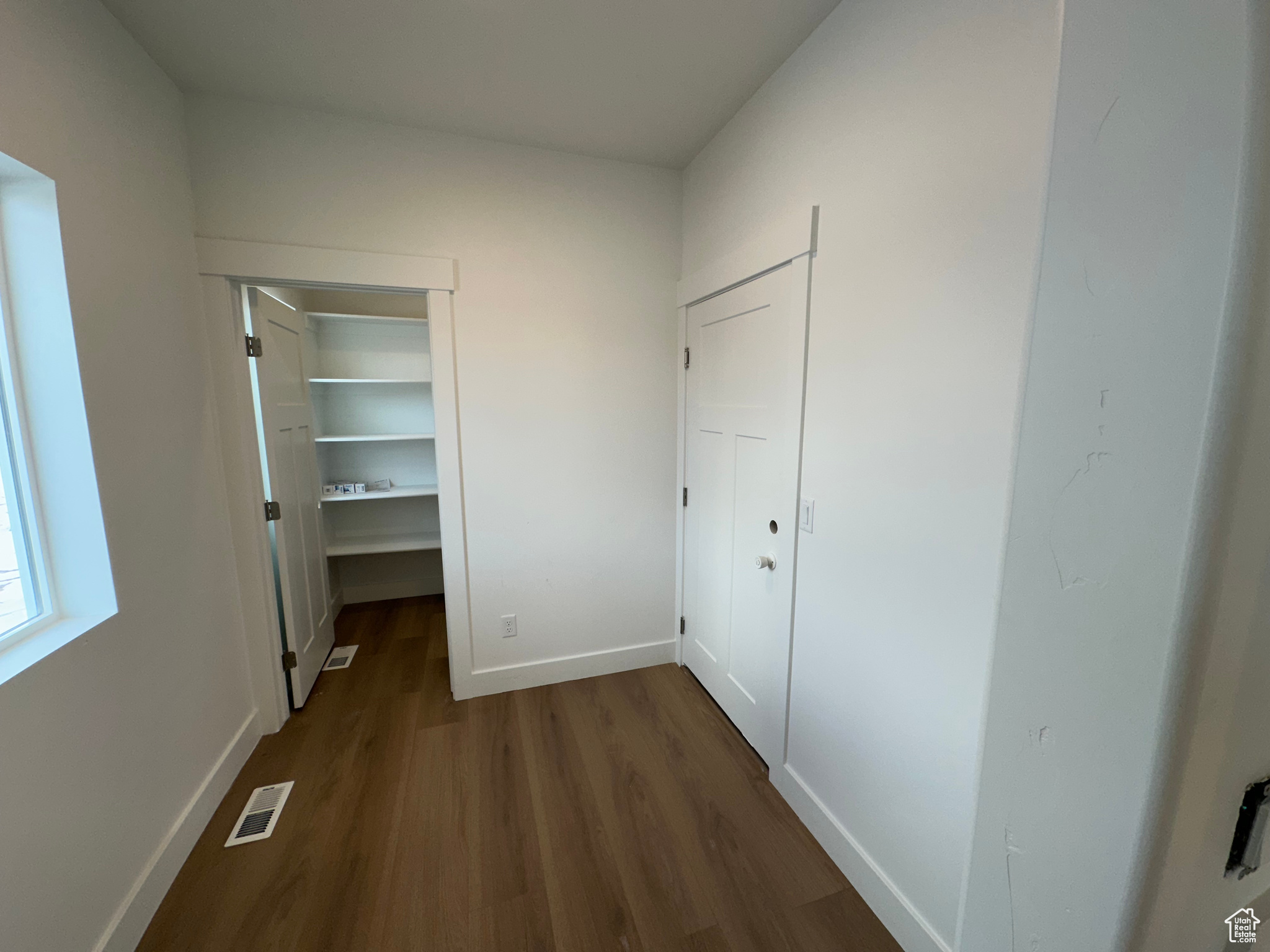 Entrance from the garage. Mudroom with access to pantry, garage and kitchen.