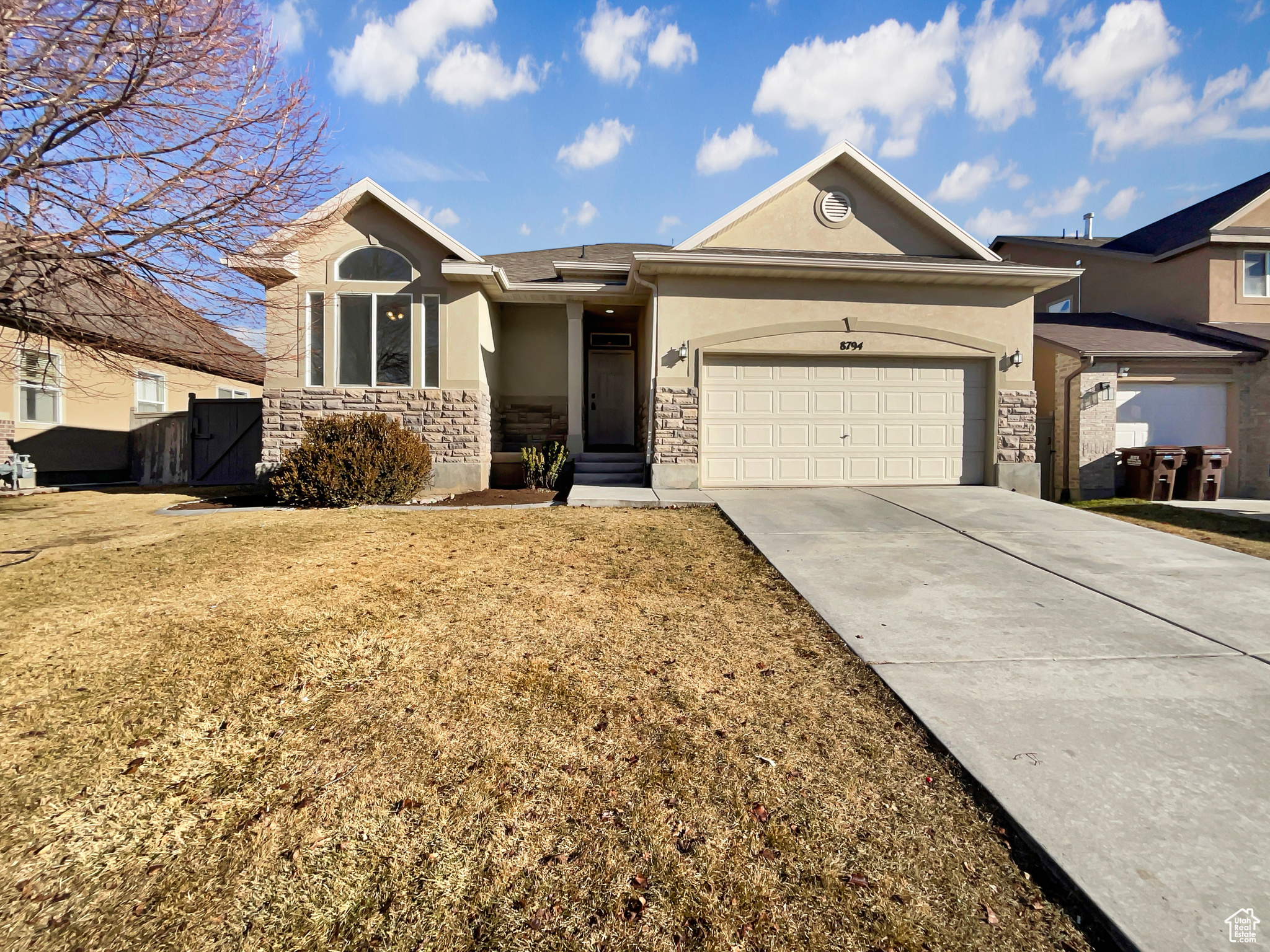 Single story home with a garage