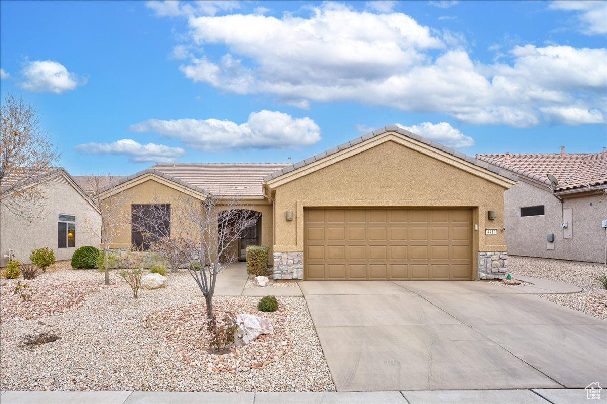 Single story home with a garage