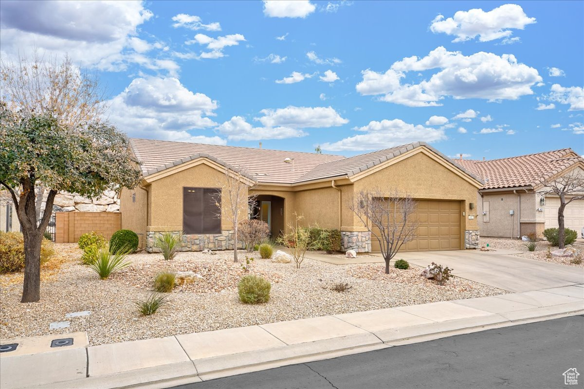 Ranch-style house with a garage