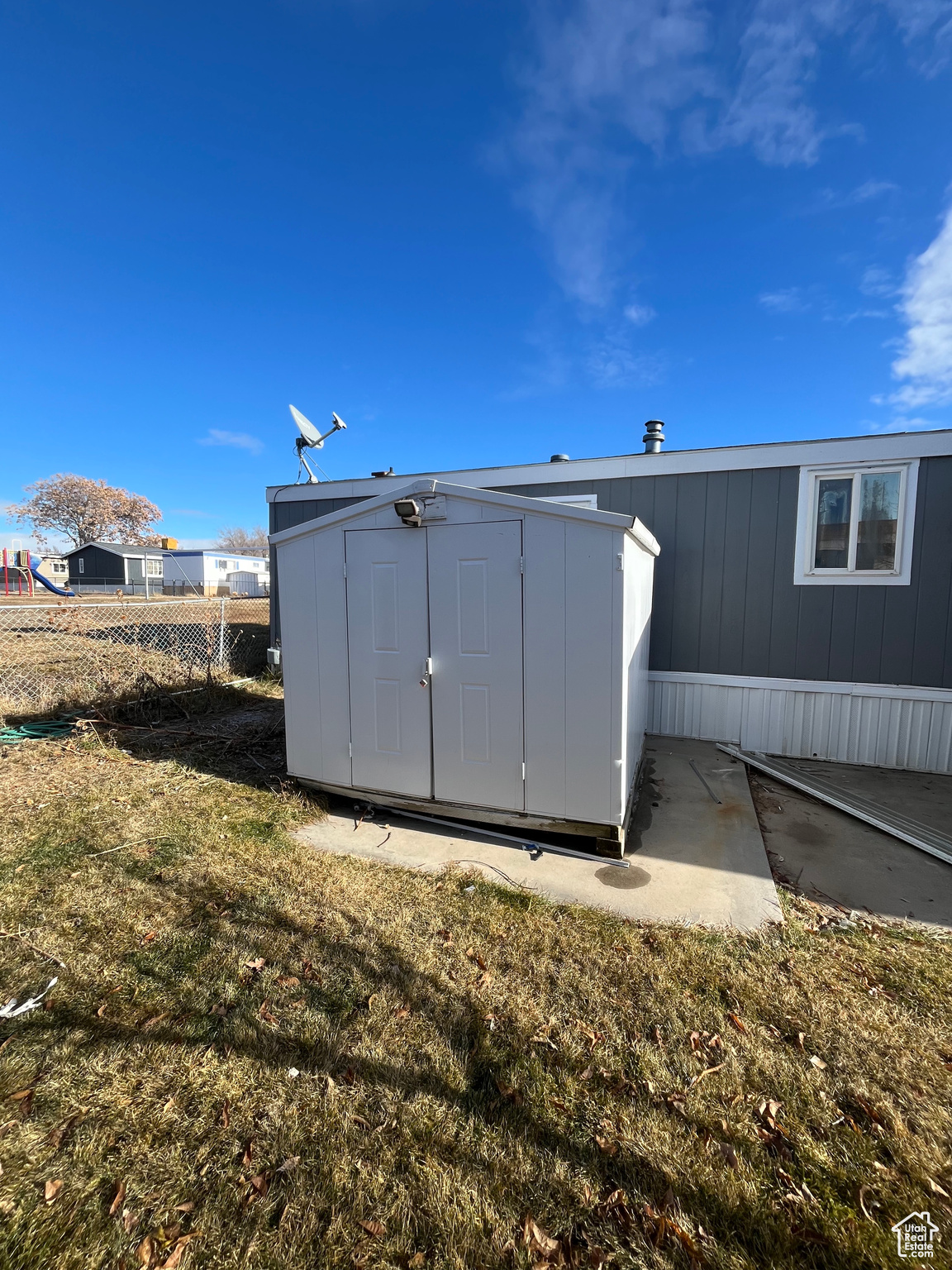 Exterior space featuring a yard