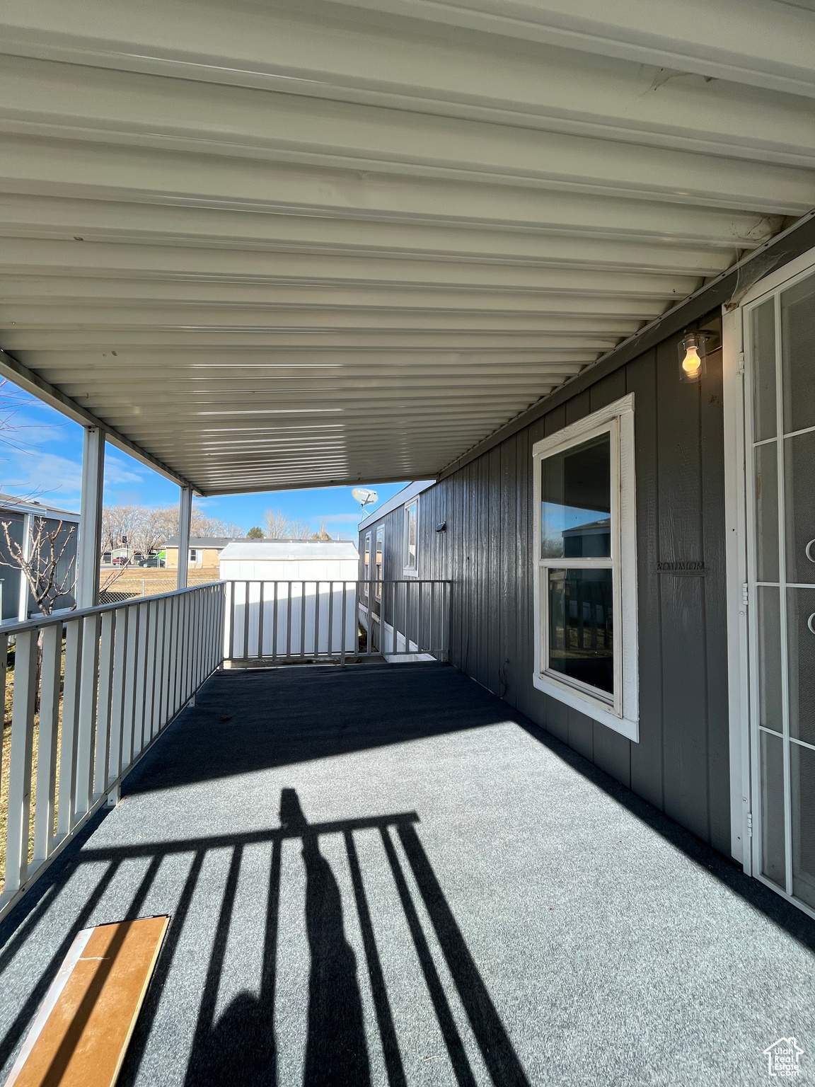 View of patio / terrace with a balcony