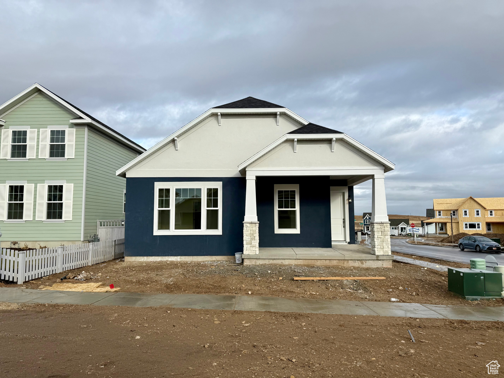 View of front of house with covered porch