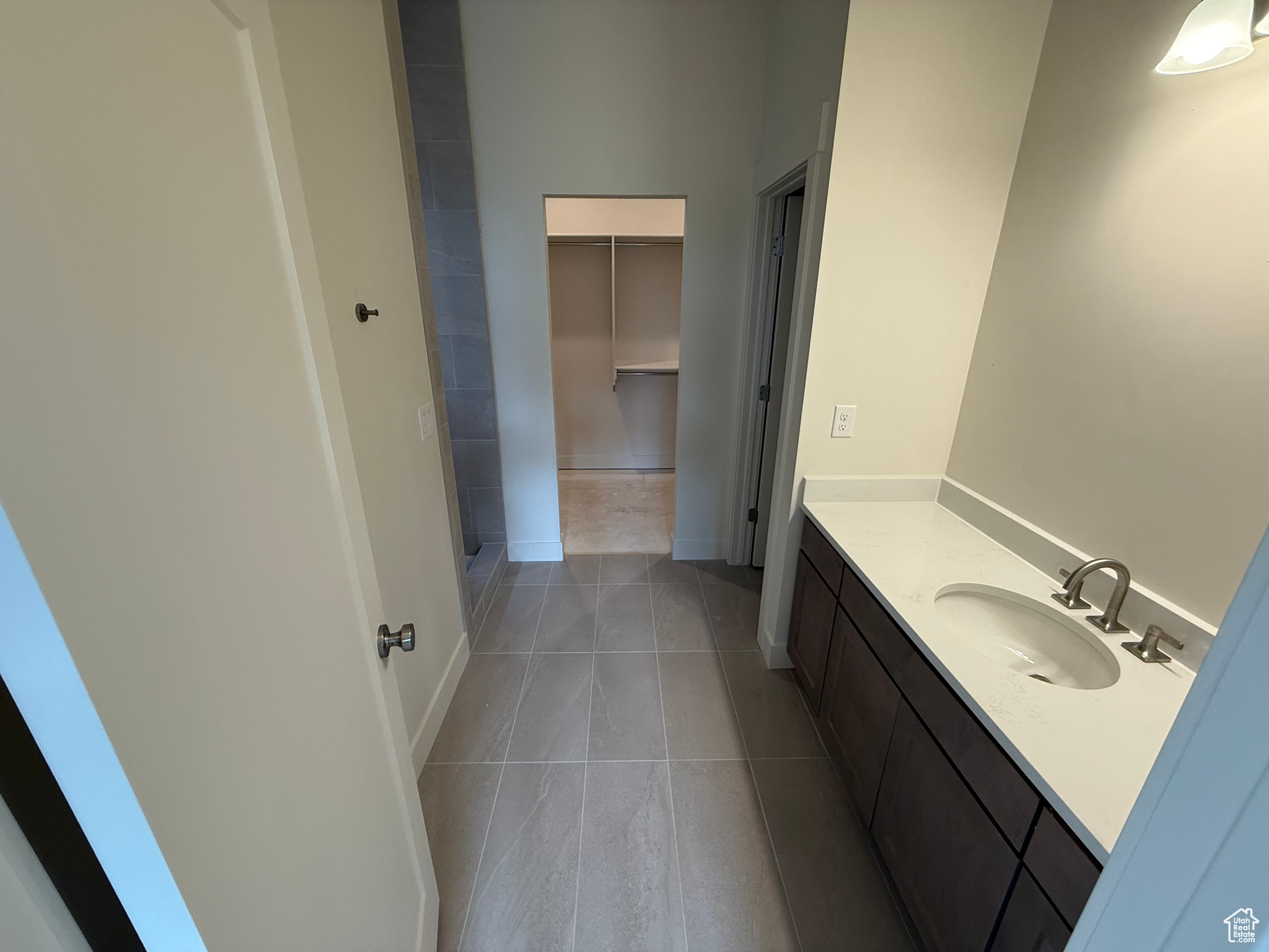 Owner's Bathroom, walk in shower is to the left, water closet to the right, and walk in closet straight ahead.