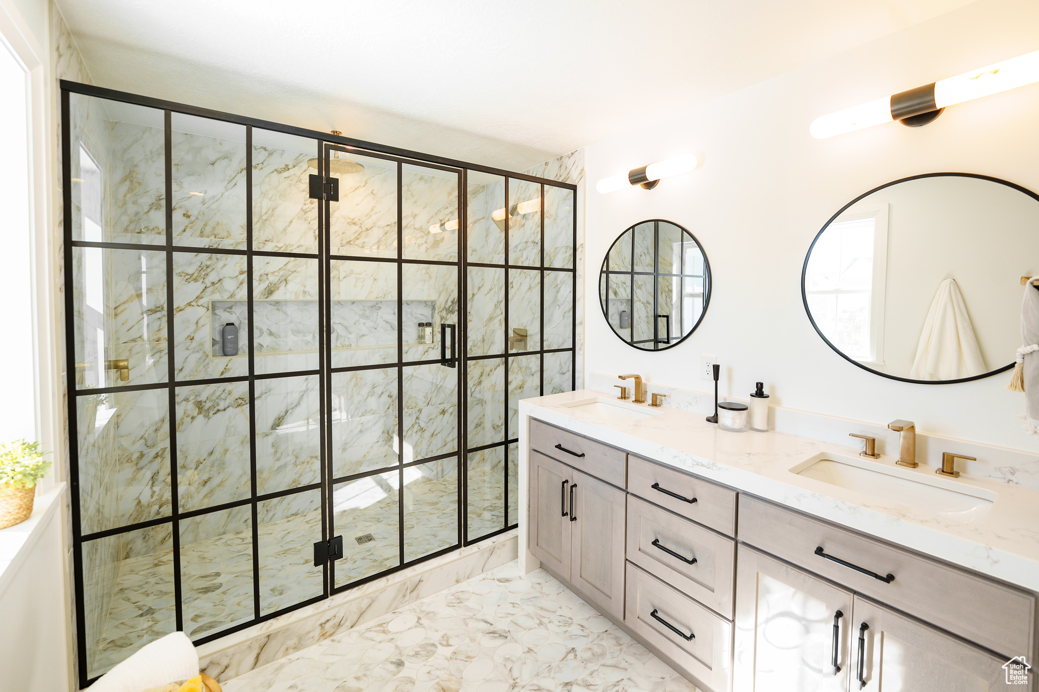 Bathroom with vanity and an enclosed shower