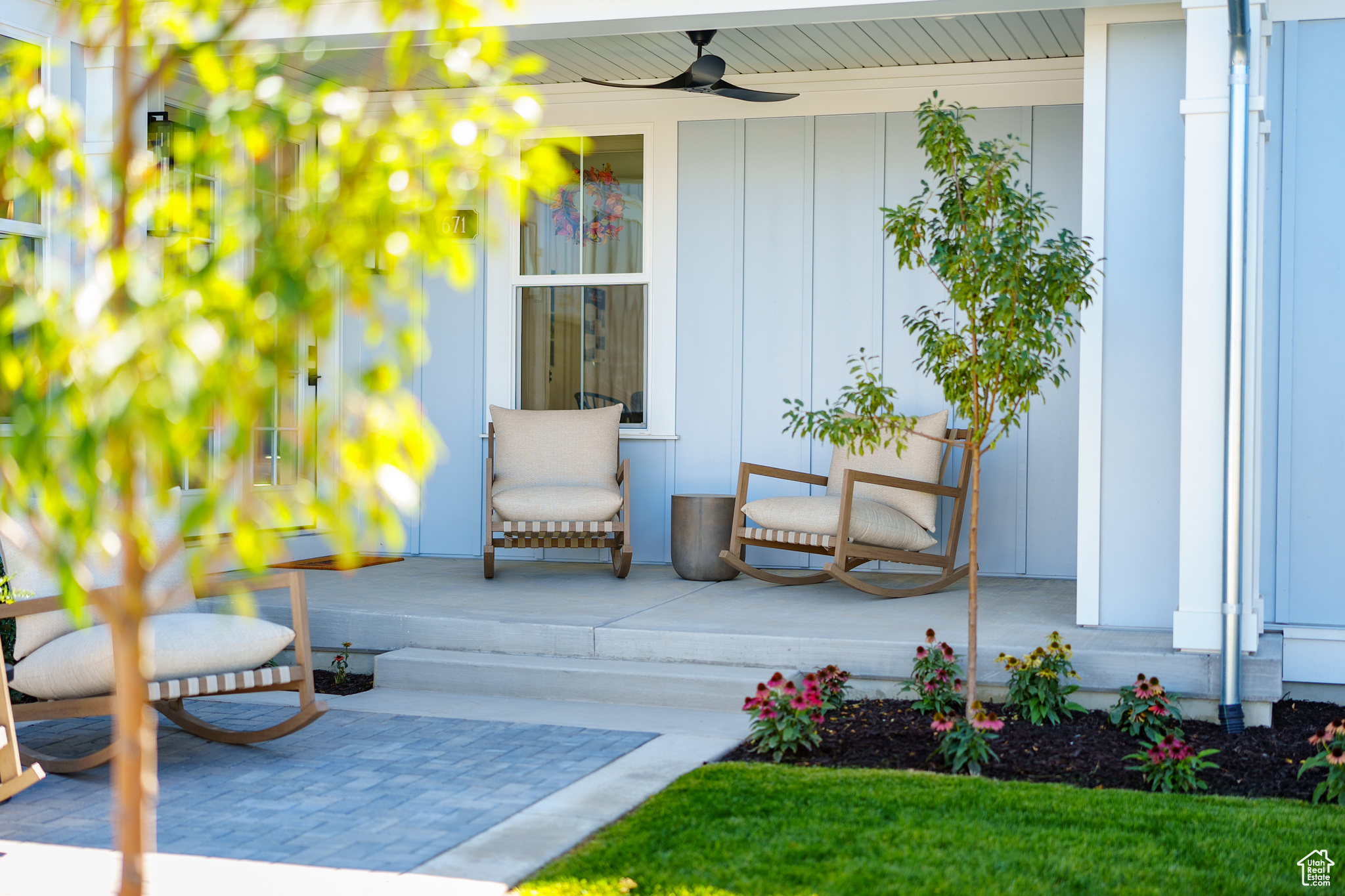 Exterior space with ceiling fan and covered porch