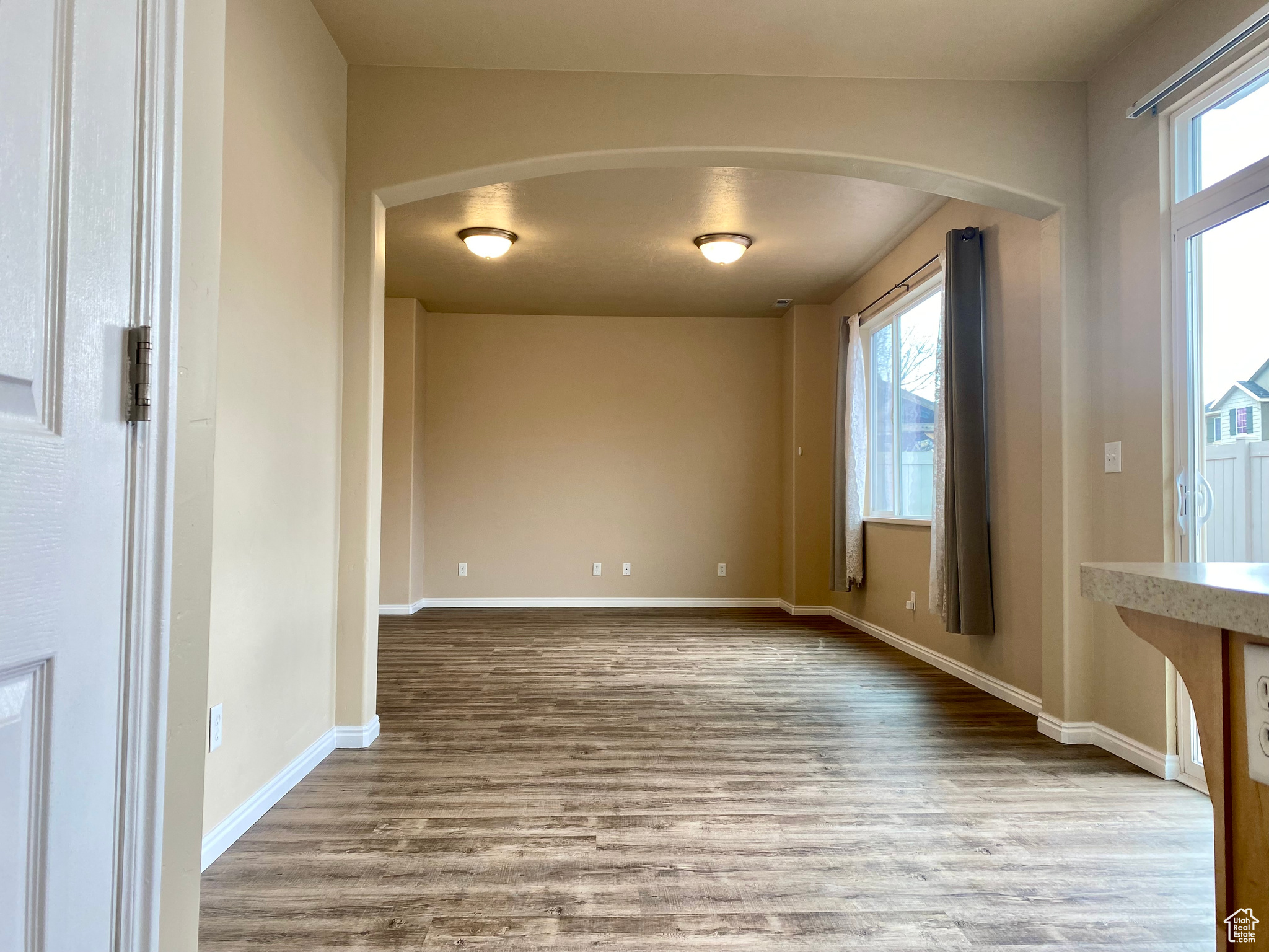 Unfurnished dining area with light wood-type flooring