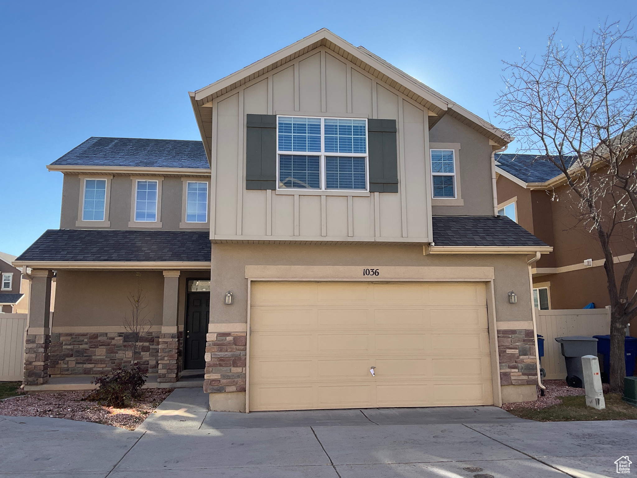 View of front of home with a garage