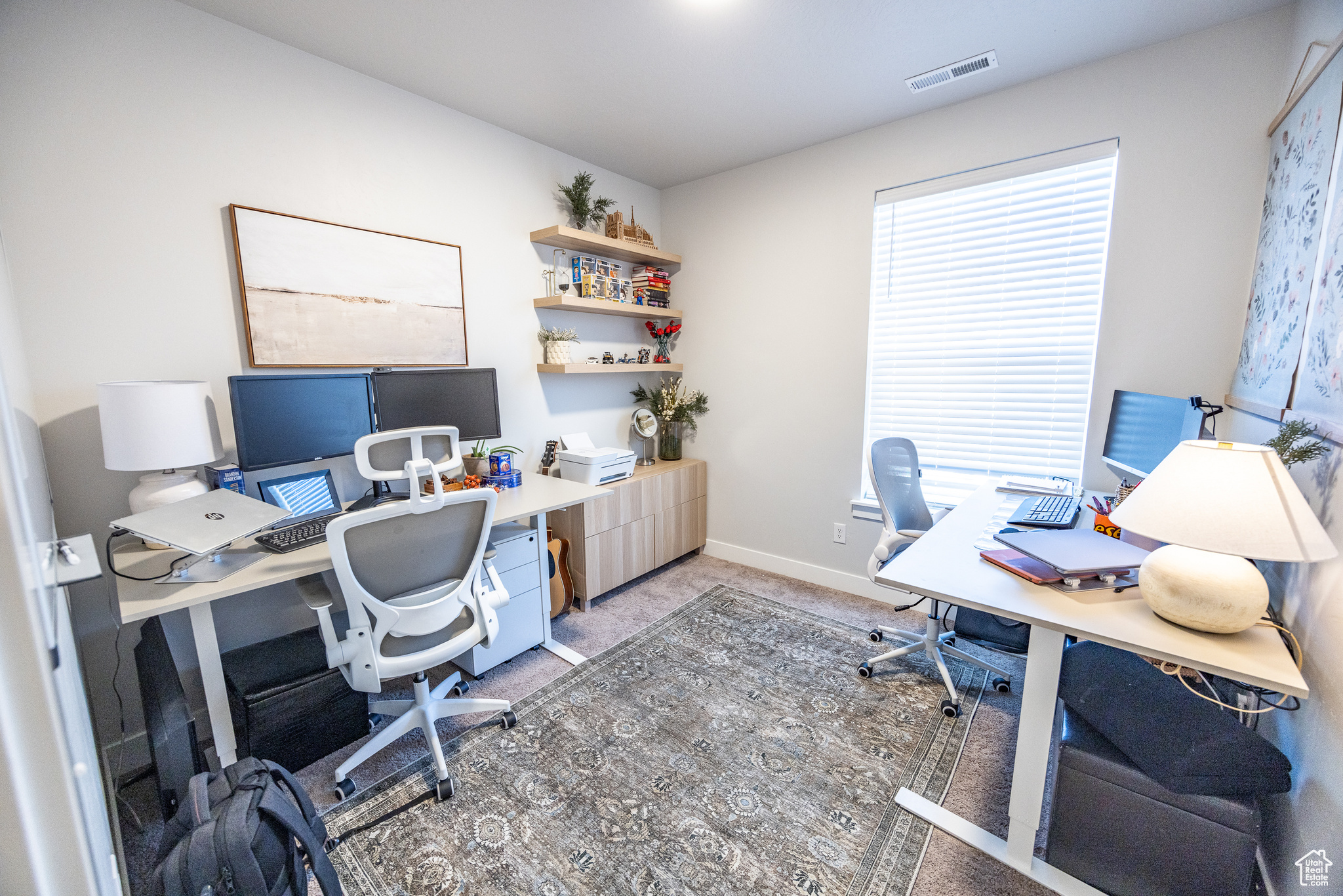 View of carpeted home office