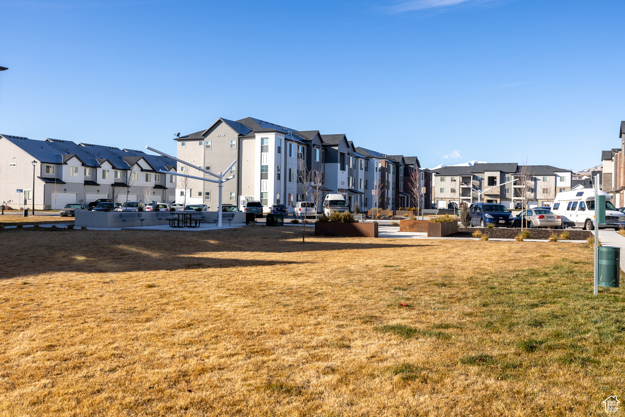 View of property's community featuring a lawn