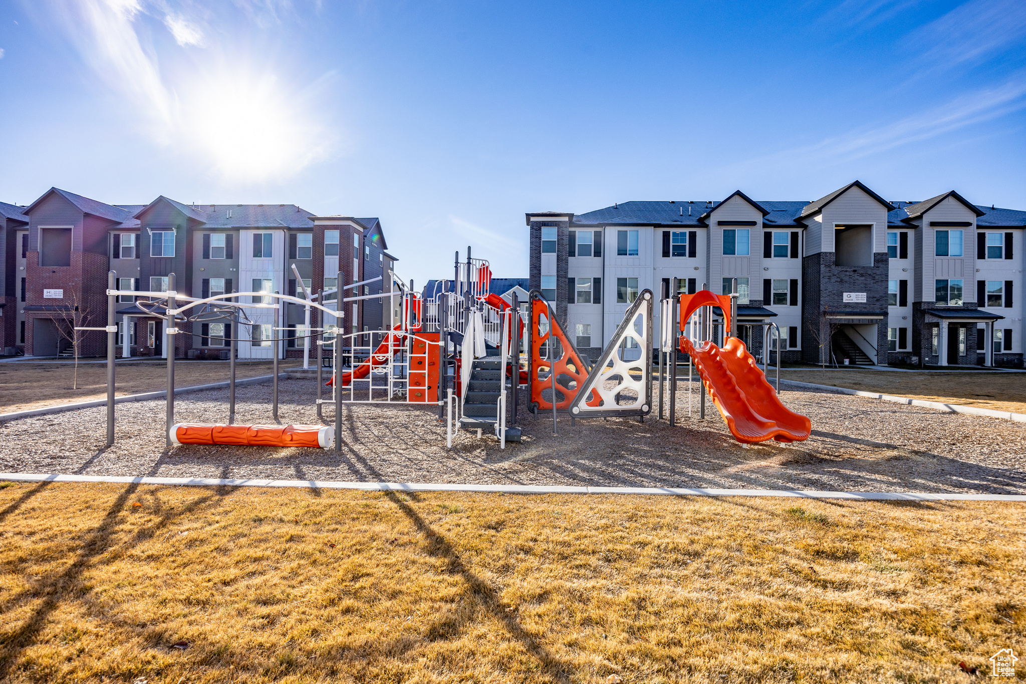 View of play area featuring a yard