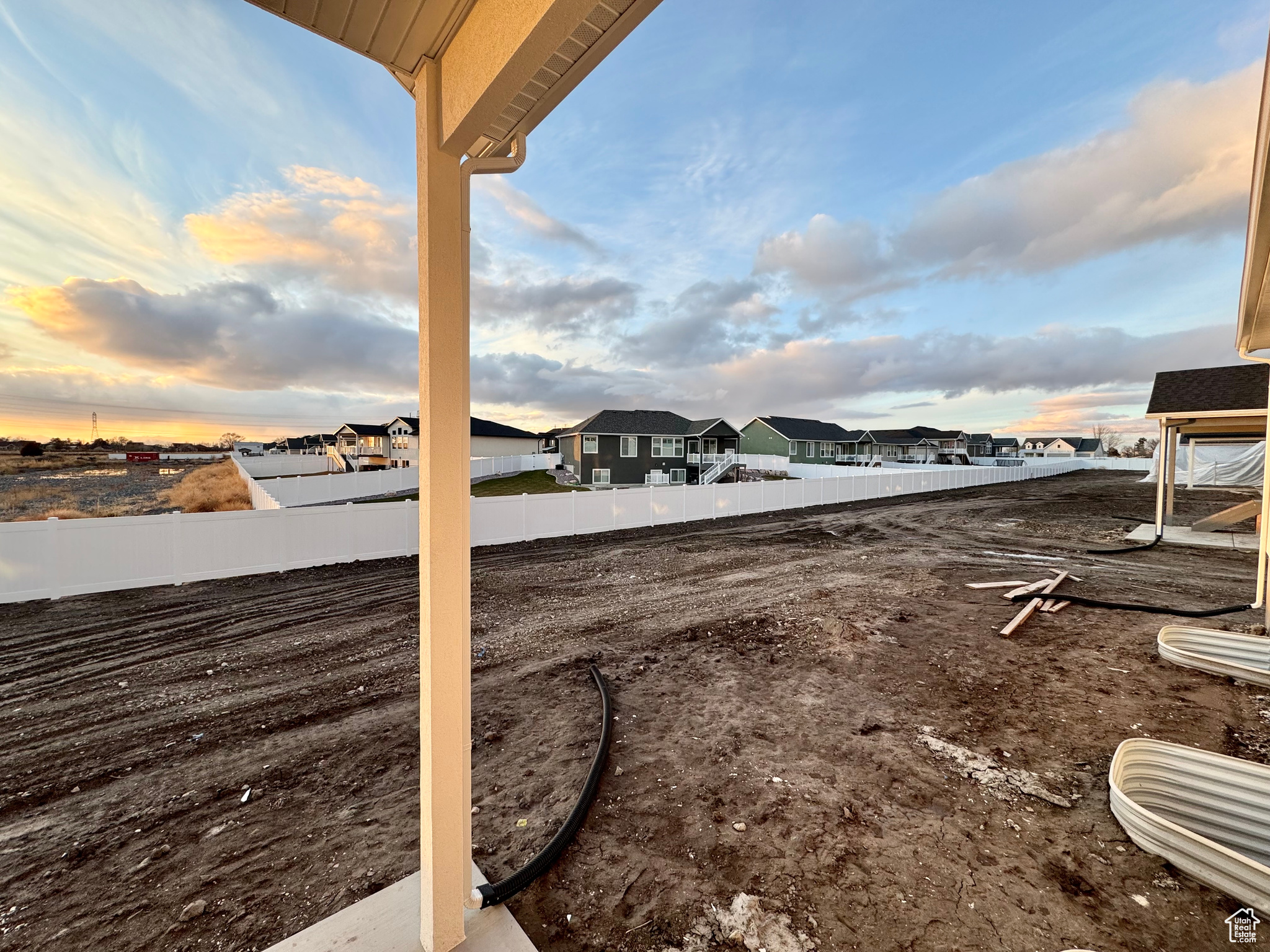 View of yard at dusk