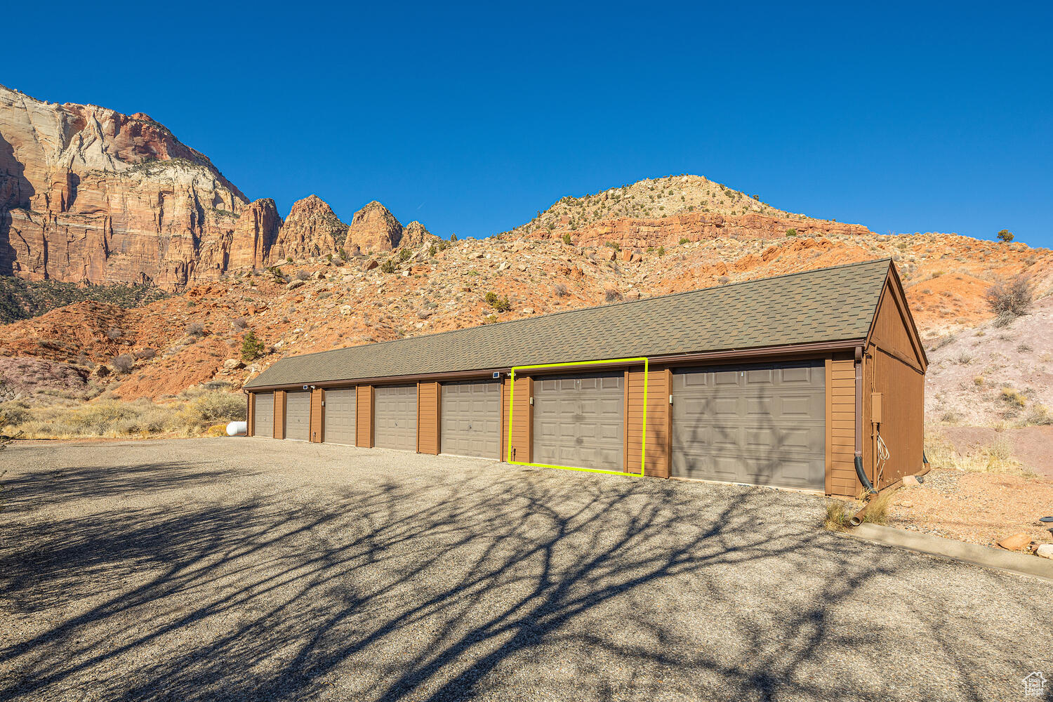 Garage featuring a mountain view