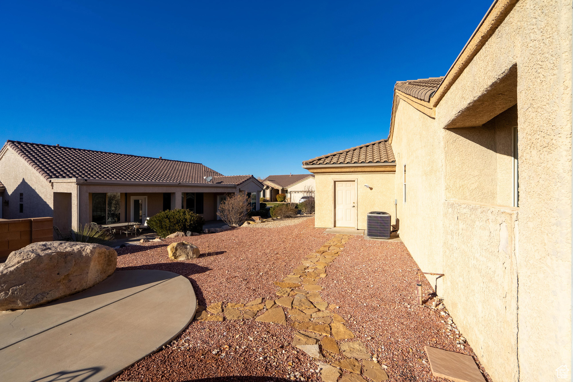 View of yard featuring cooling unit and a patio