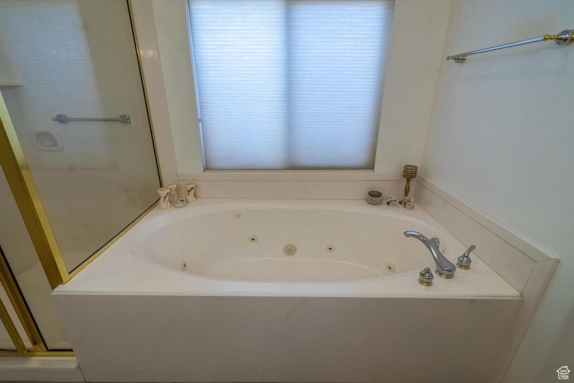 Bathroom with a jetted bathtub