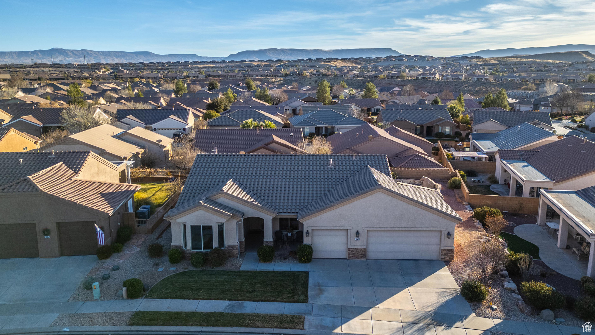 Birds eye view of property with a mountain view