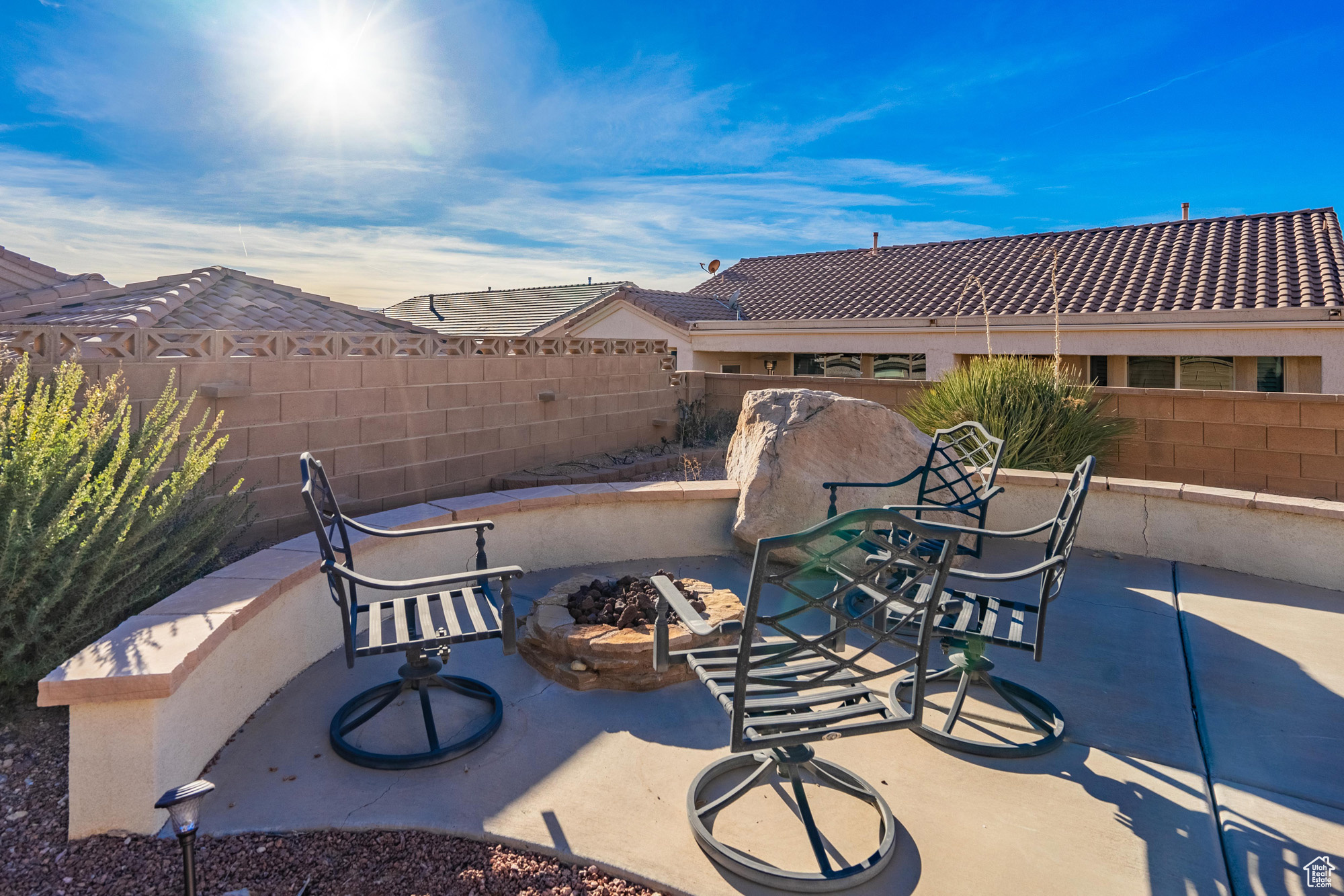 View of patio / terrace featuring an outdoor fire pit