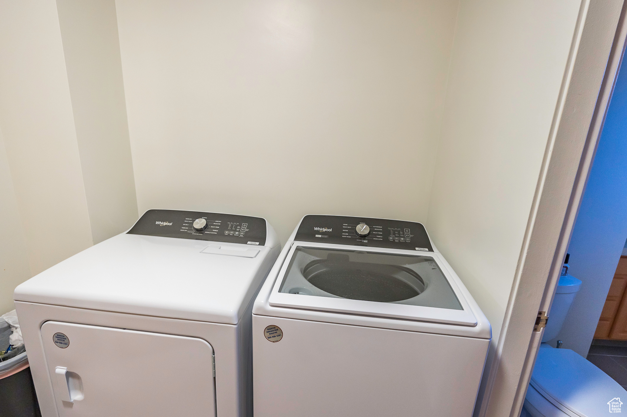 Washroom featuring separate washer and dryer