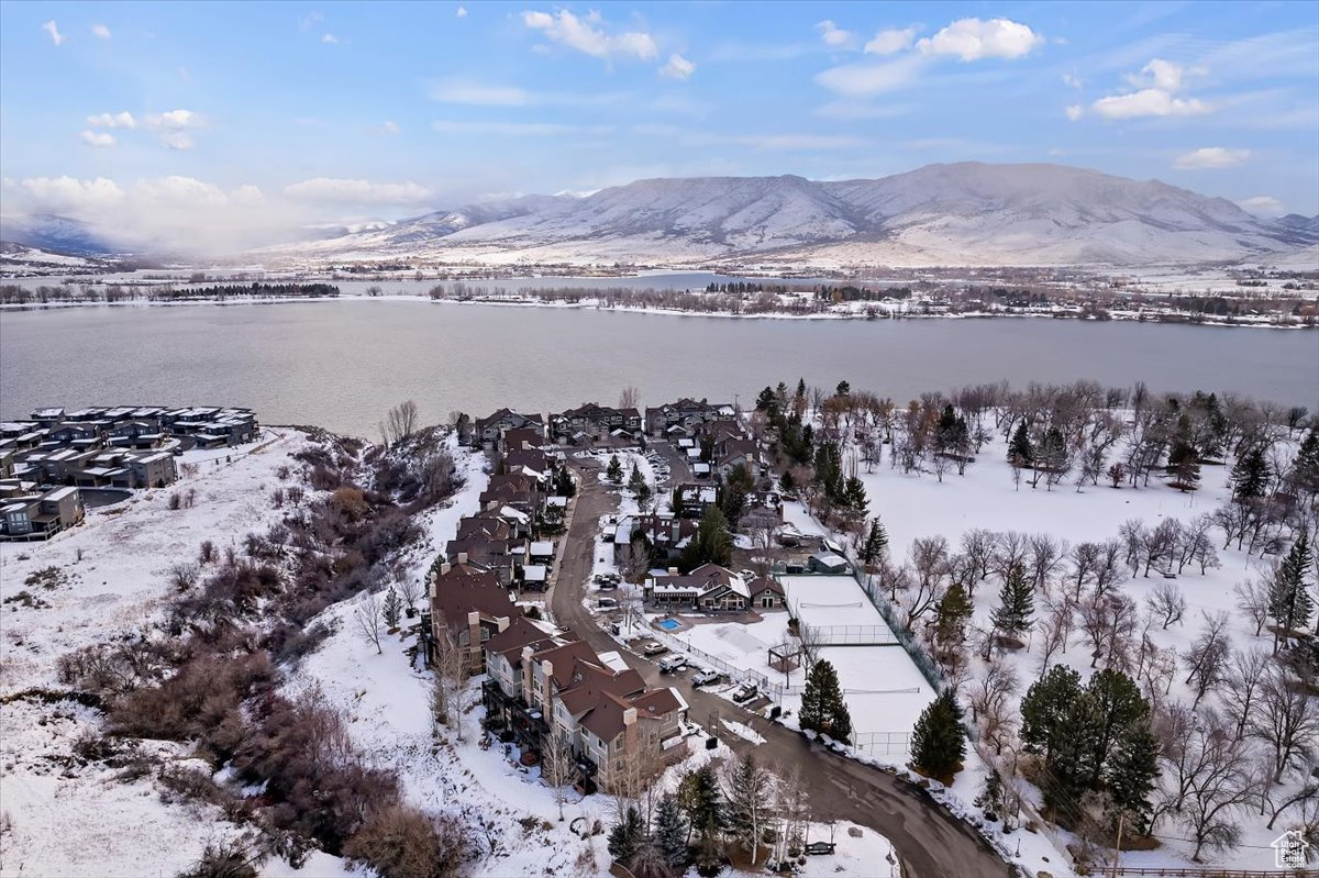 Mountain view featuring a water view