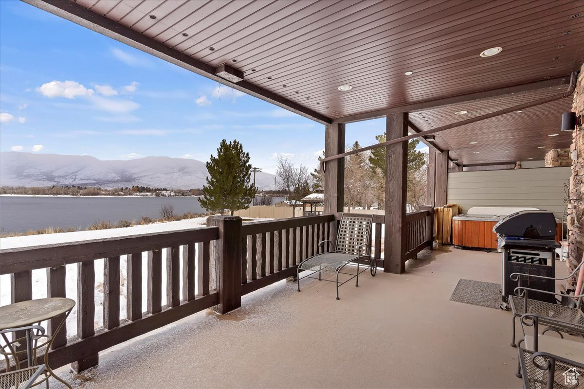 Deck  with gas area for grilling, Lake &  mountain view, and a hot tub