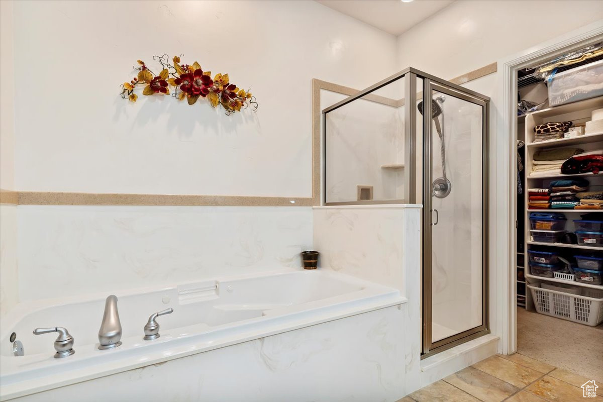 Bathroom with plus walk in shower