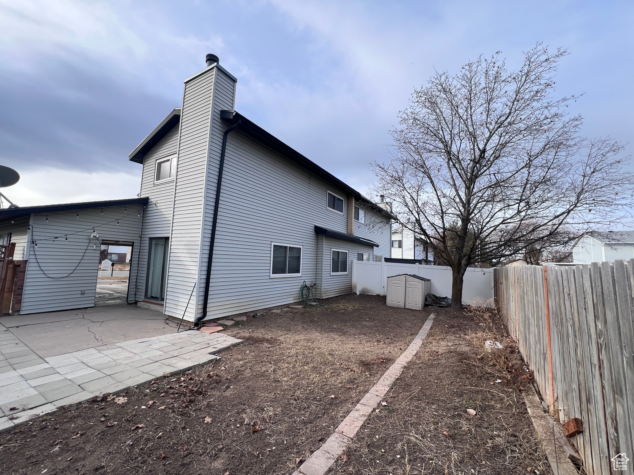 Back of property featuring a patio area