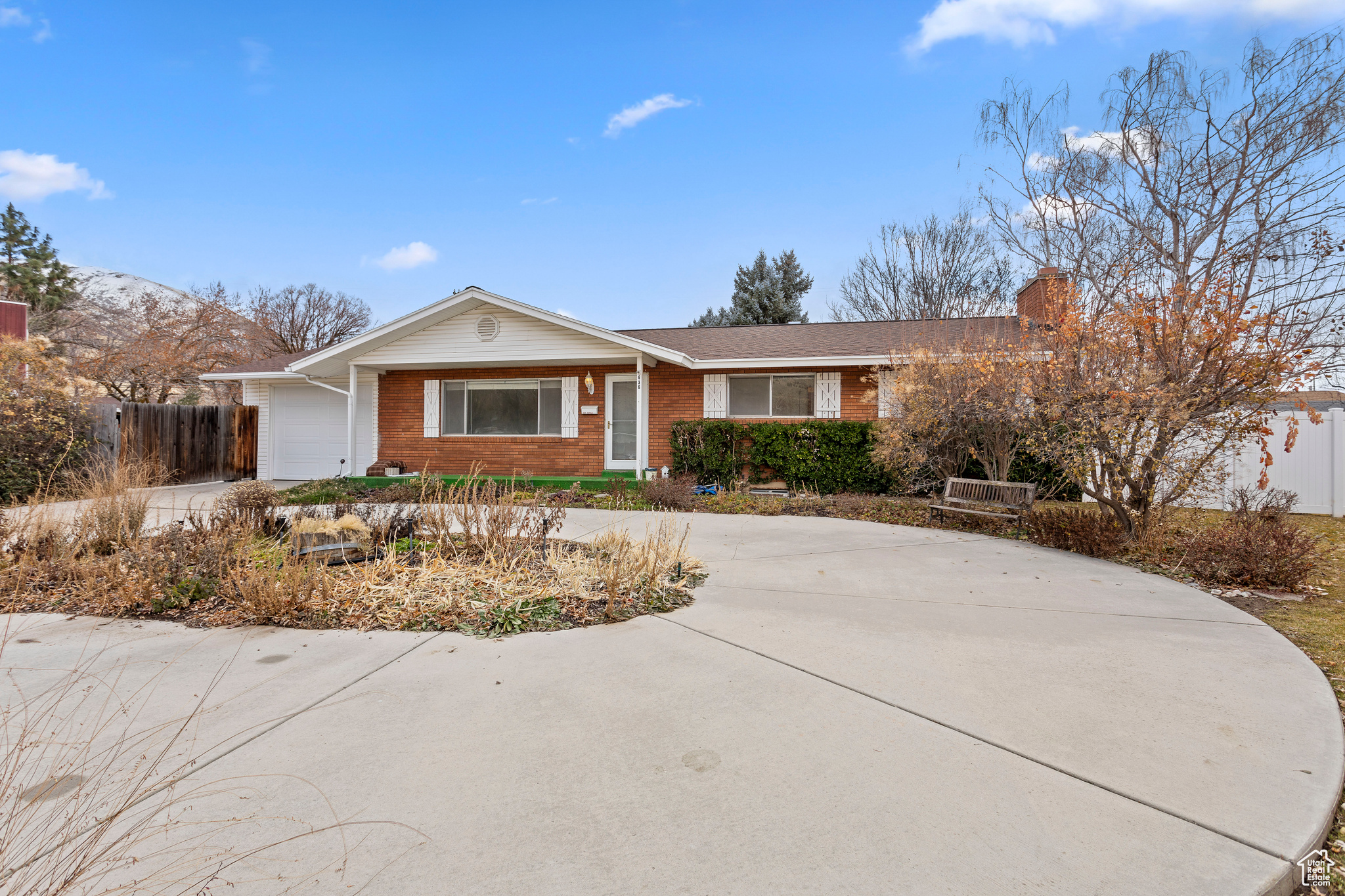 Ranch-style home featuring a garage