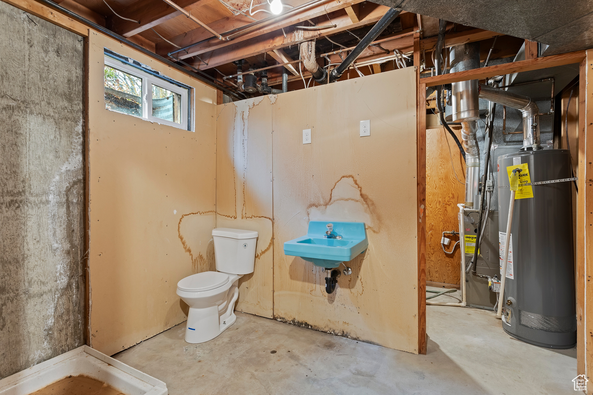 Basement with sink and water heater