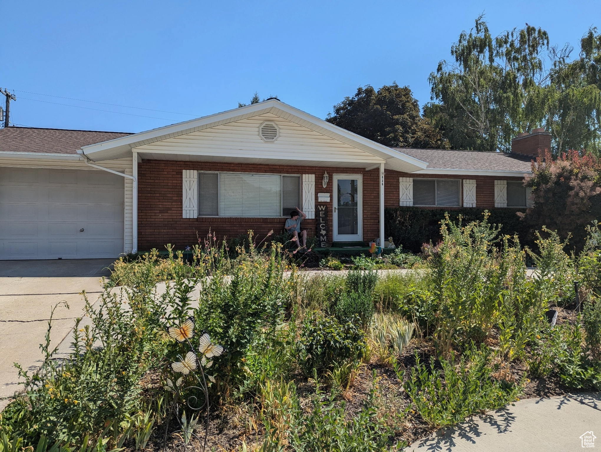 Ranch-style home featuring a garage