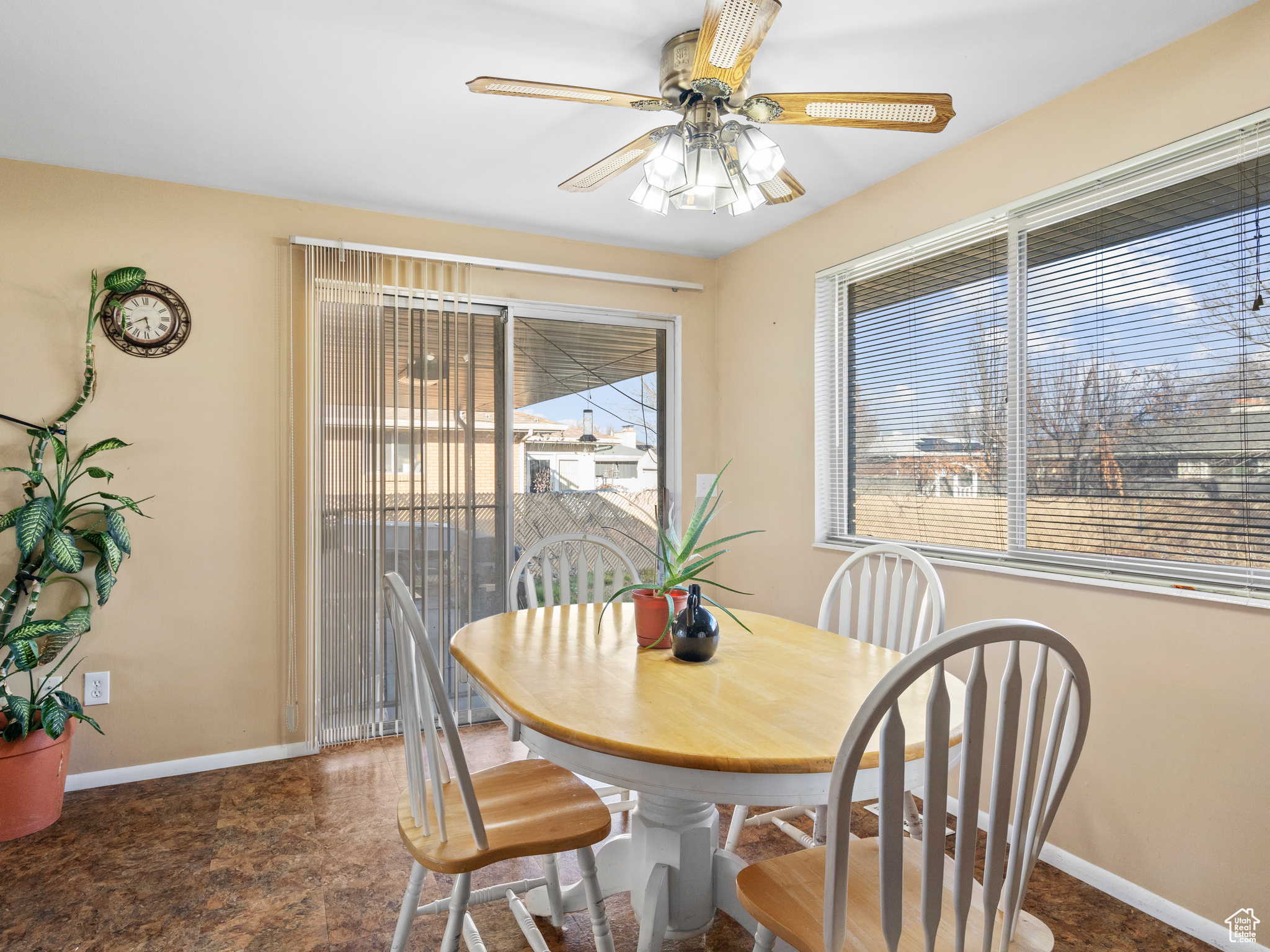 Dining area with ceiling fan