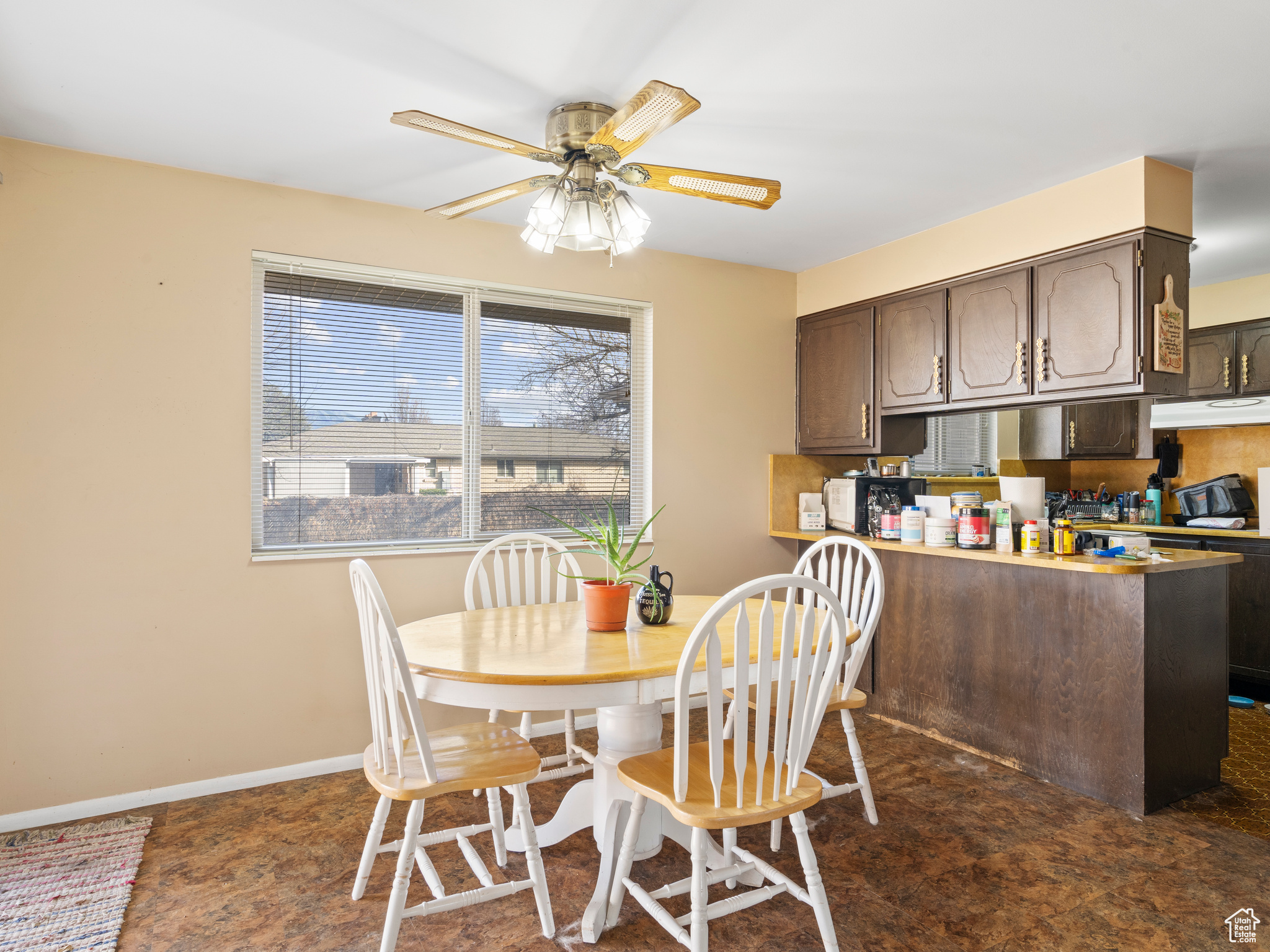 Dining room featuring ceiling fan