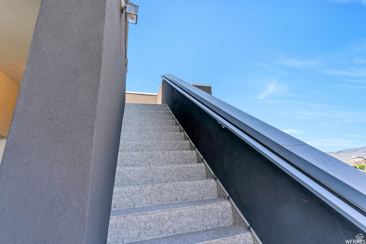 Stairs featuring a mountain view