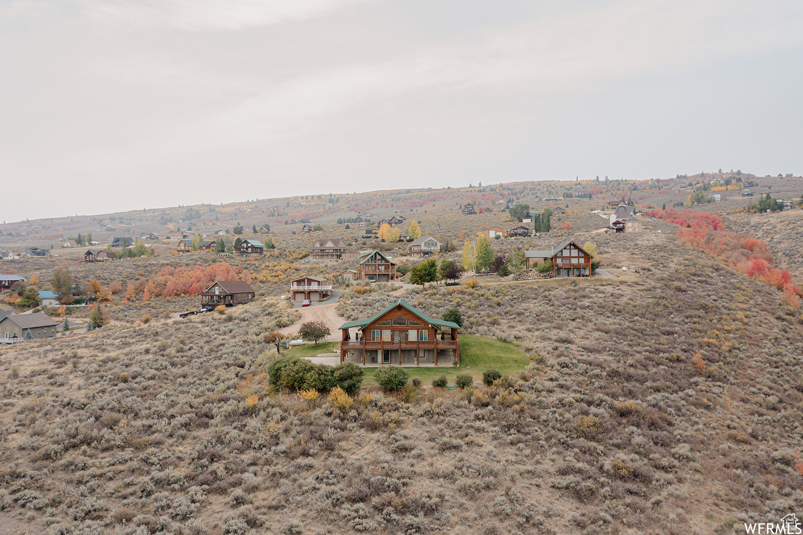 Birds eye view of property with a rural view