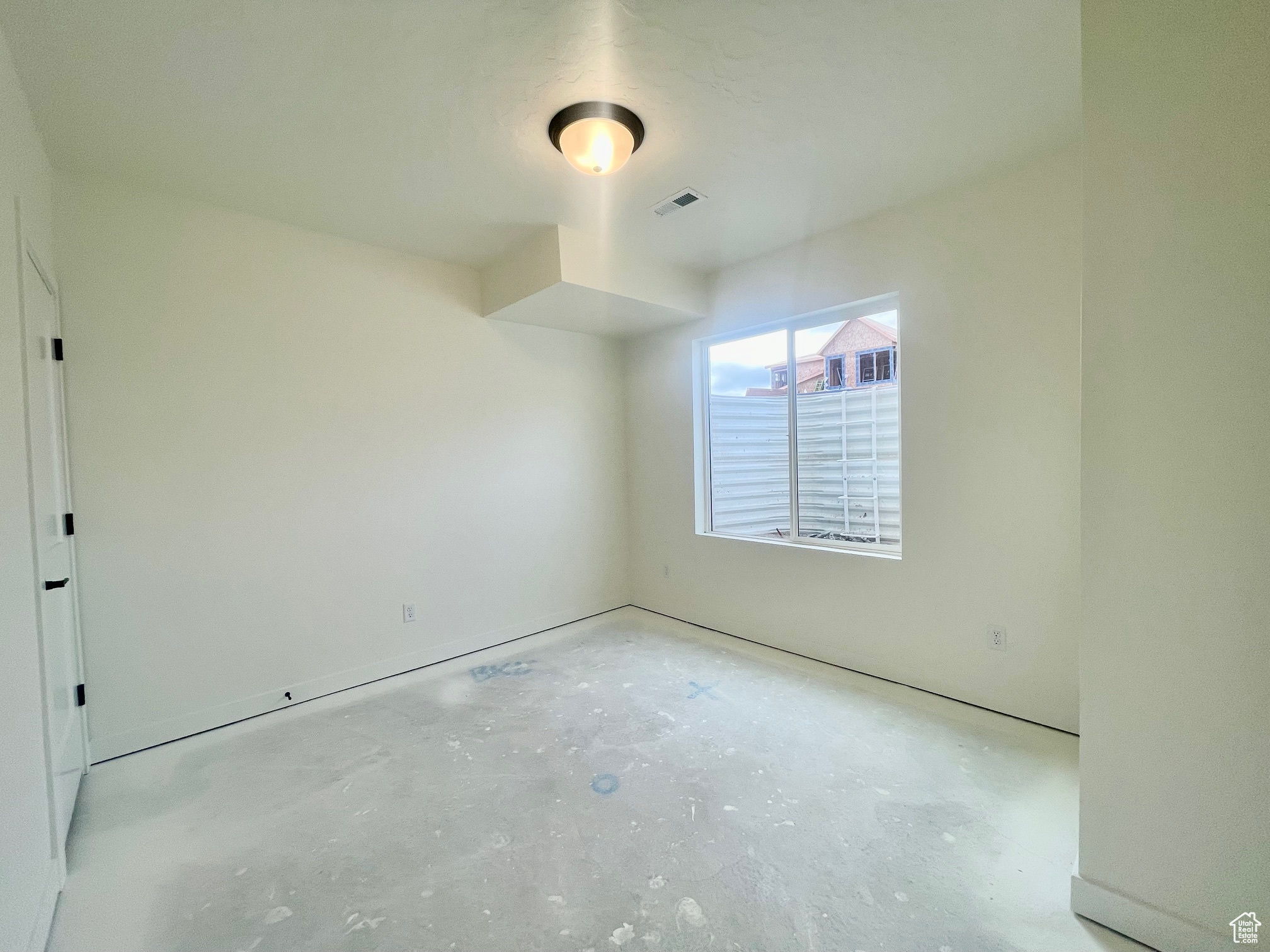 View of empty room in basement