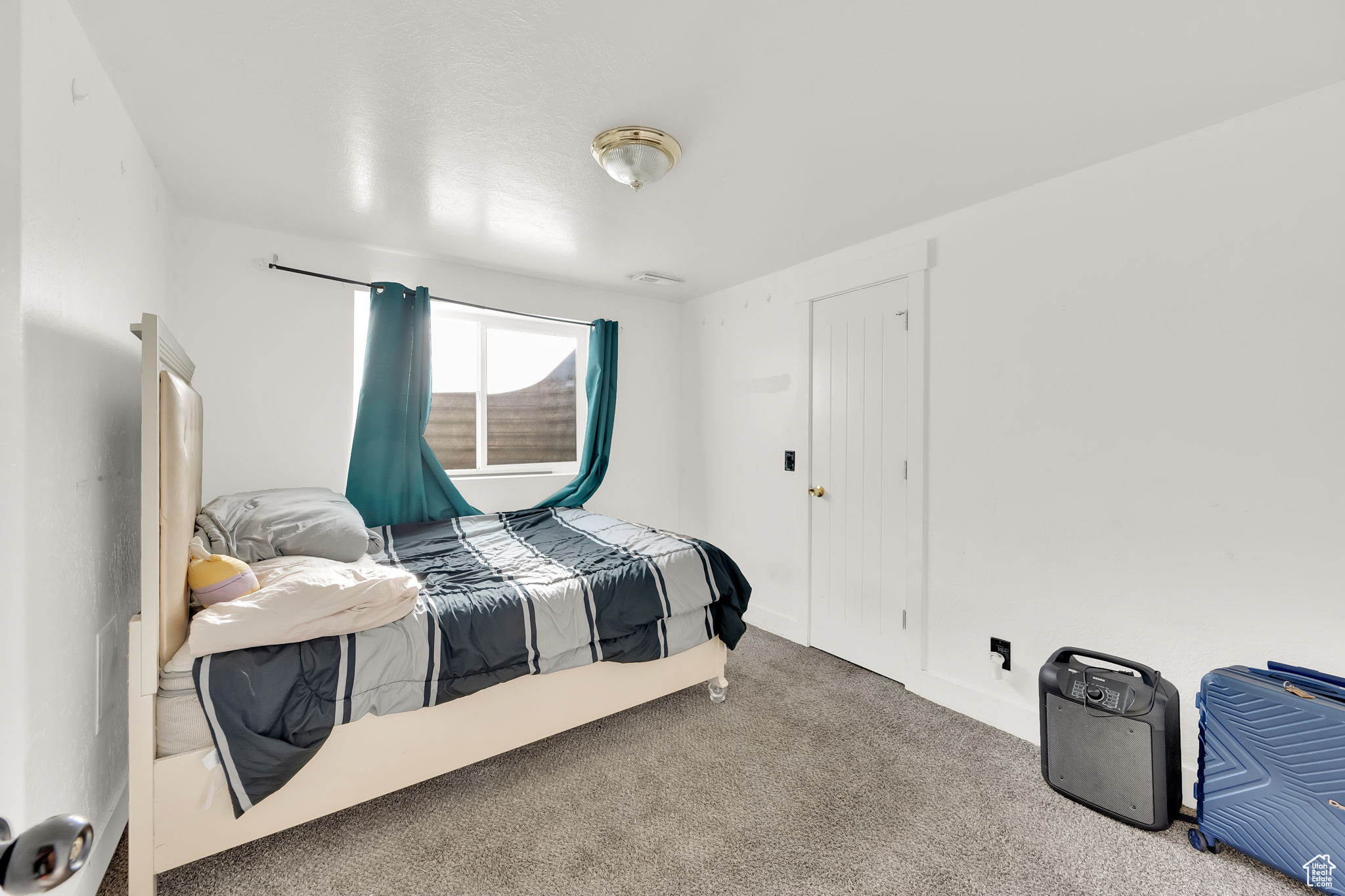 Bedroom with carpet flooring