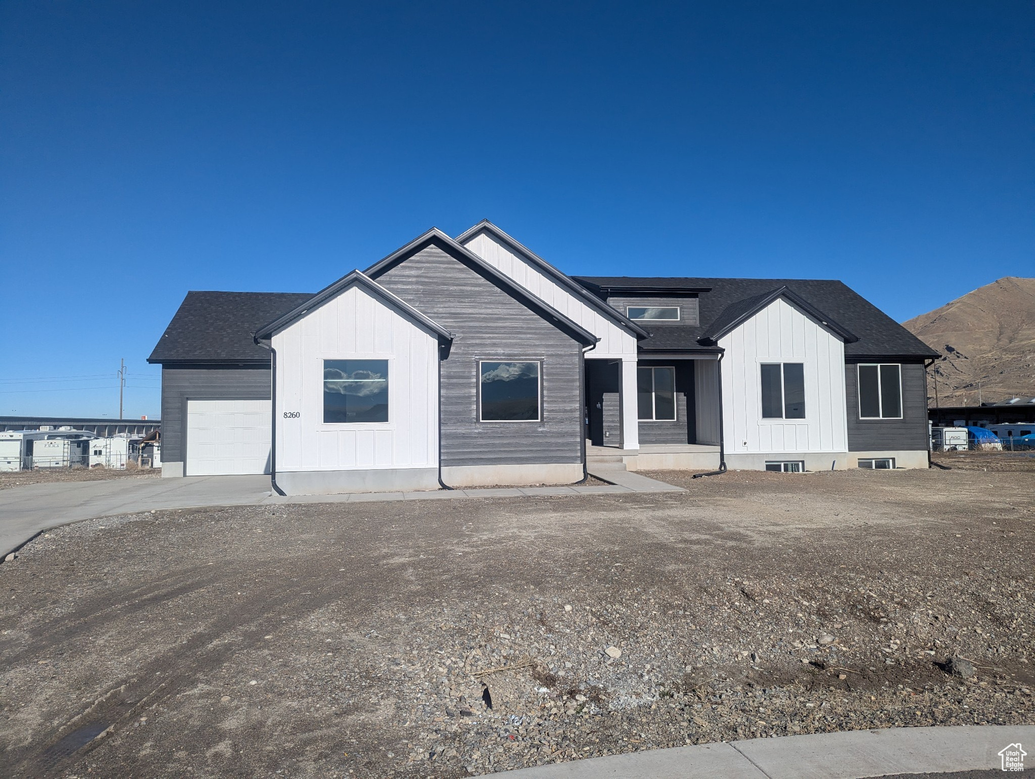 View of front of home featuring a garage