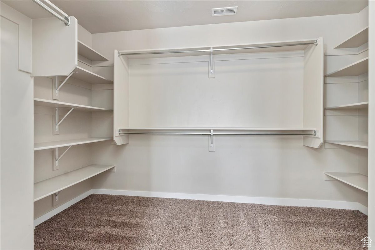 Huge walk-in-closet with organizer in the Owner's Suite