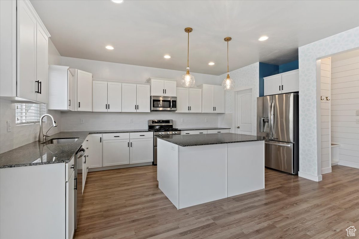 Spacious Kitchen featuring Granite Countertops and a large island, perfect for dining, gathering, and hosting guests.