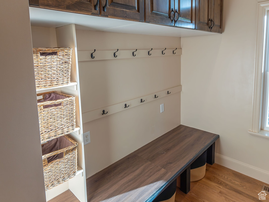 Mudroom featuring light wood-type flooring