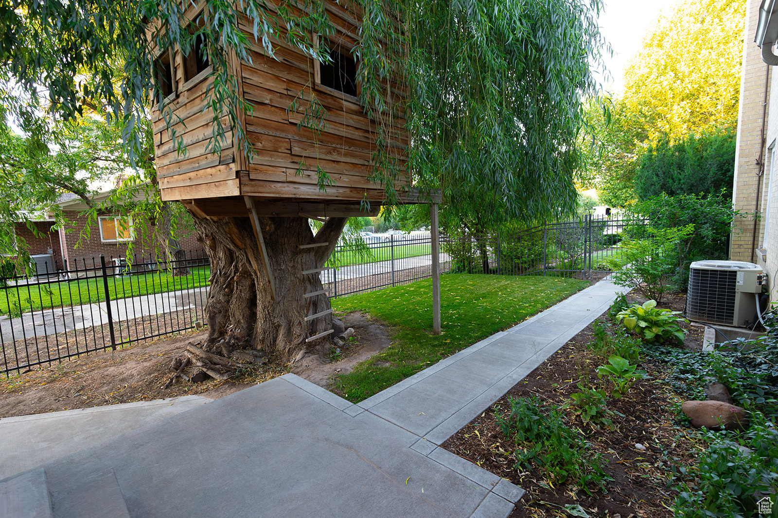 View of yard with central AC