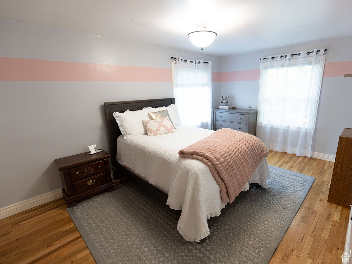 Bedroom featuring light hardwood / wood-style floors