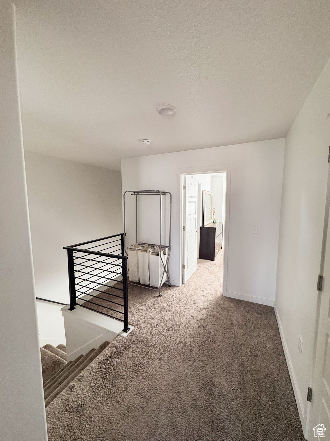 Empty room featuring carpet floors