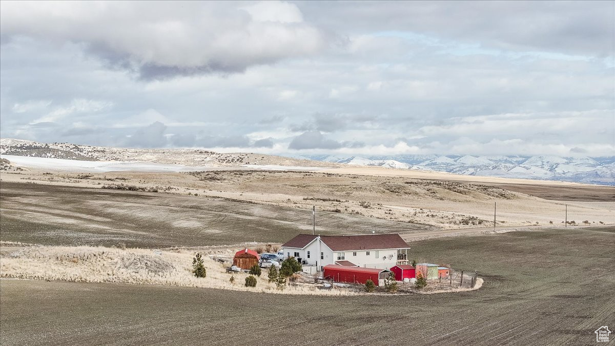 Exterior space with a mountain view and a rural view