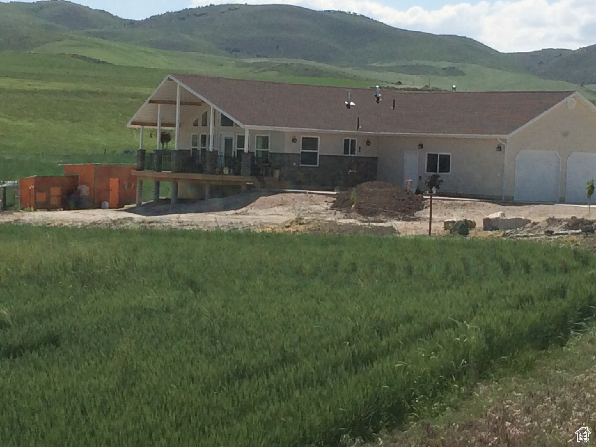 Rear view of property featuring a mountain view