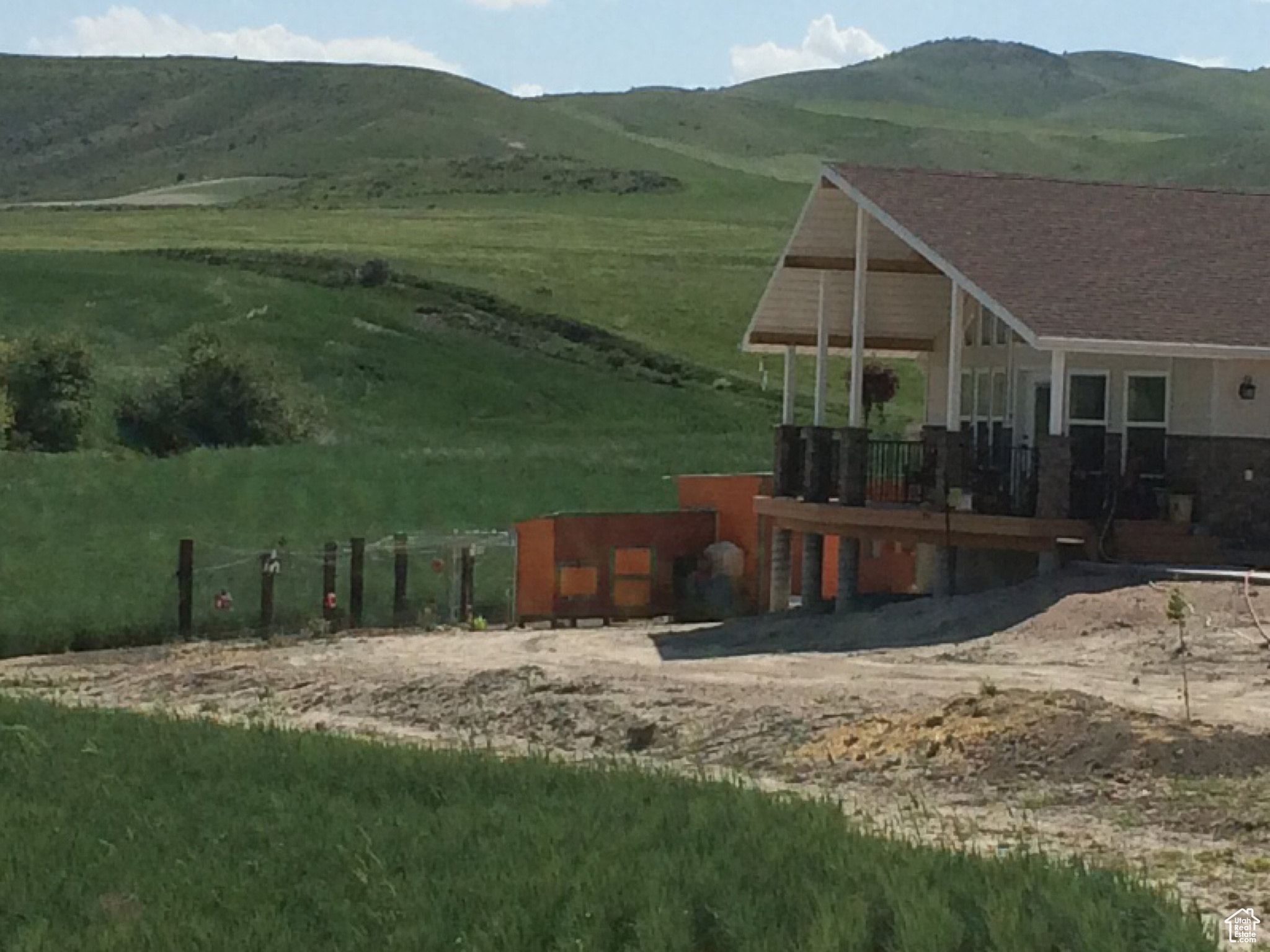 Property view of mountains with a rural view